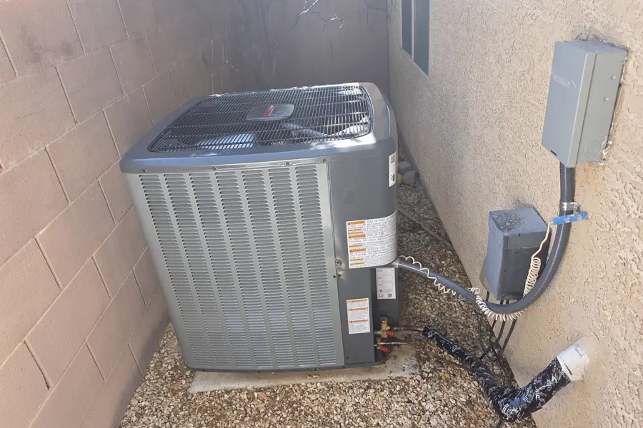 Air conditioner condenser and disconnect in a Las Vegas side yard